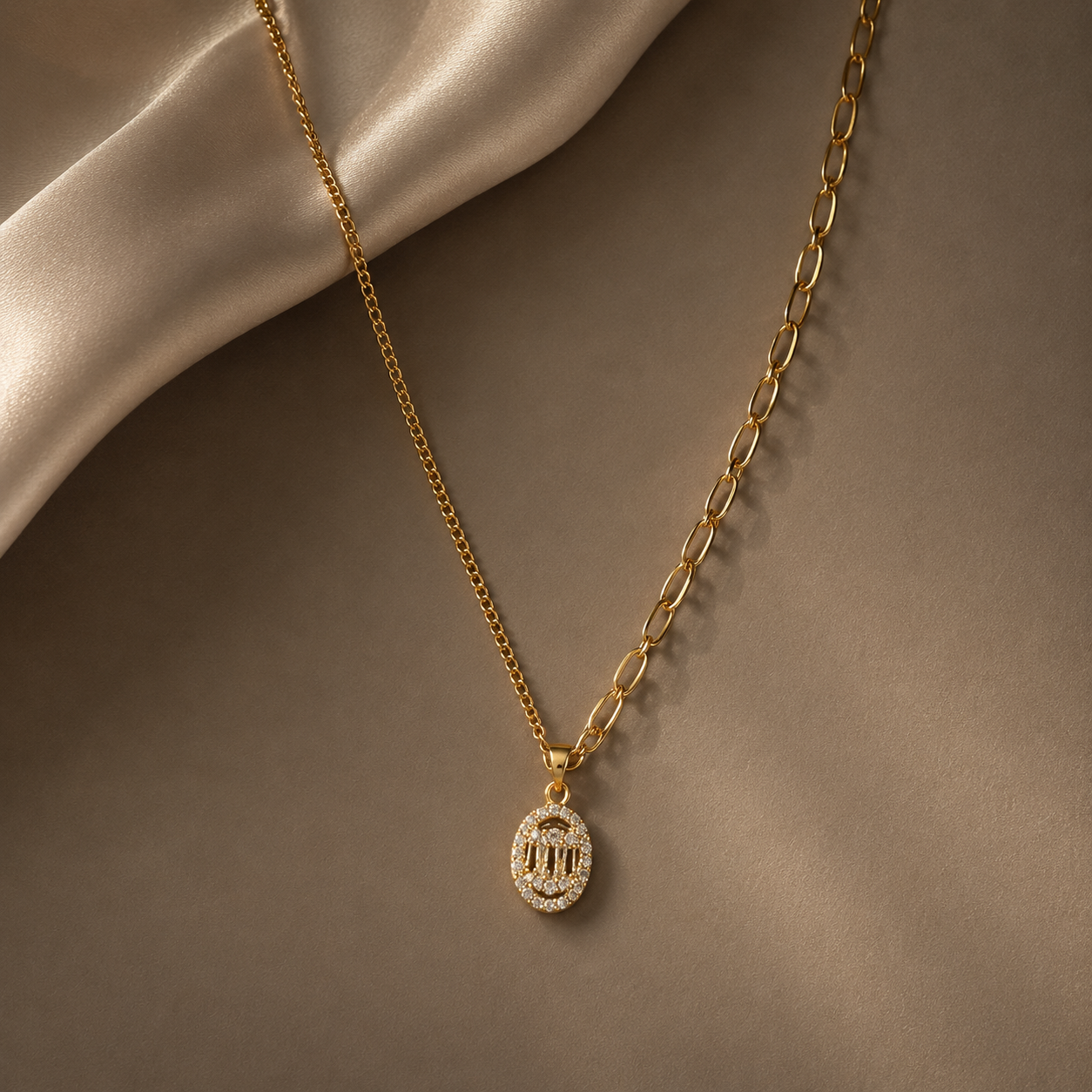 Gold necklace with a diamond pendant on a brown surface