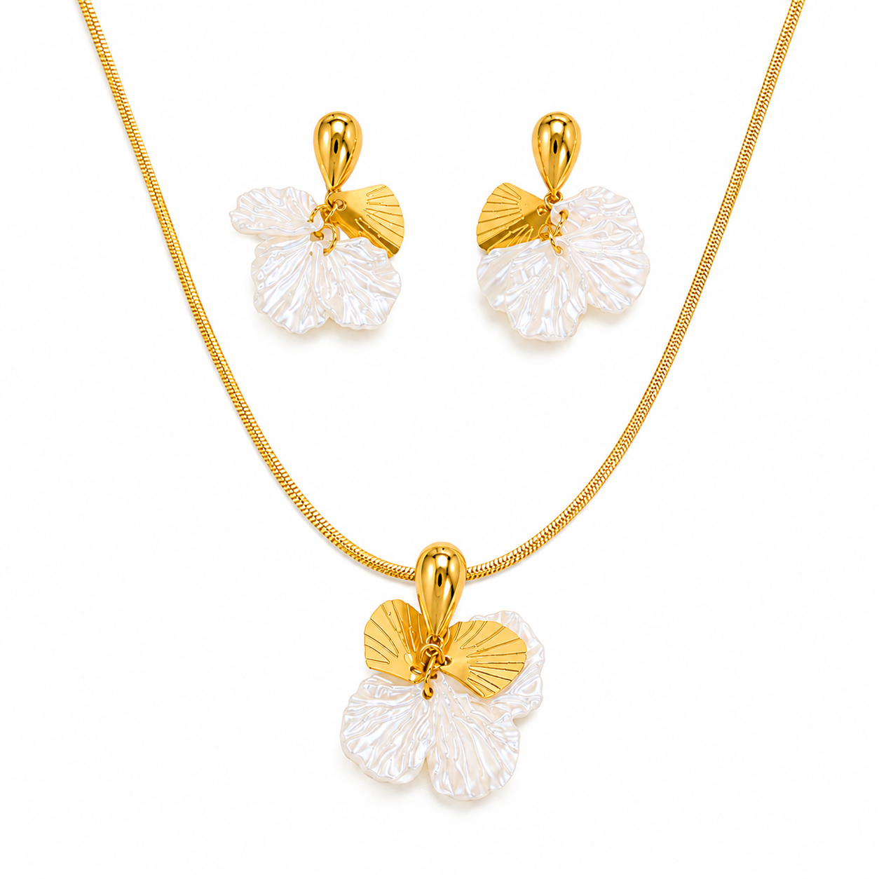 Gold necklace and matching earrings with flower-shaped pendants featuring textured white petals and polished gold centers, displayed on a clean white background.