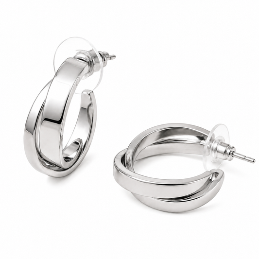 A pair of polished silver hoop earrings with a double-band twisted design, shown on a clean white background.