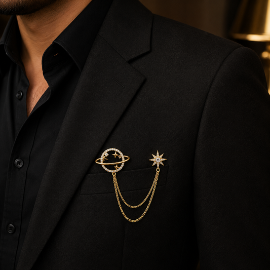 Black suit jacket with decorative brooches on a dark background