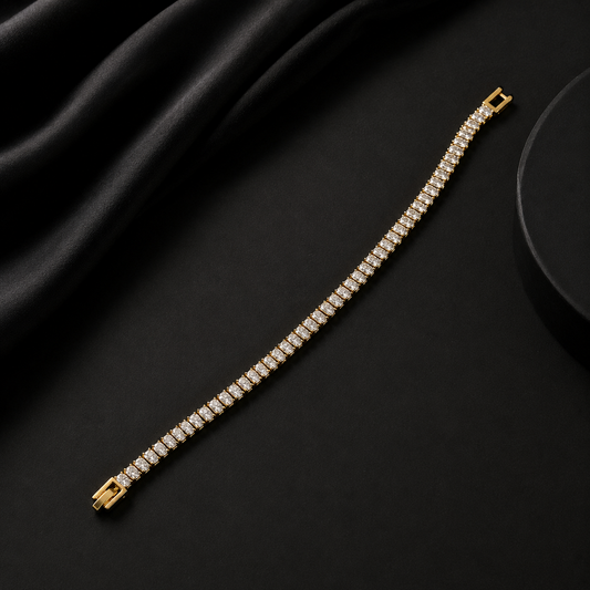 Gold bracelet with diamonds on a black fabric background